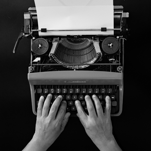 Hands arranging messaging elements